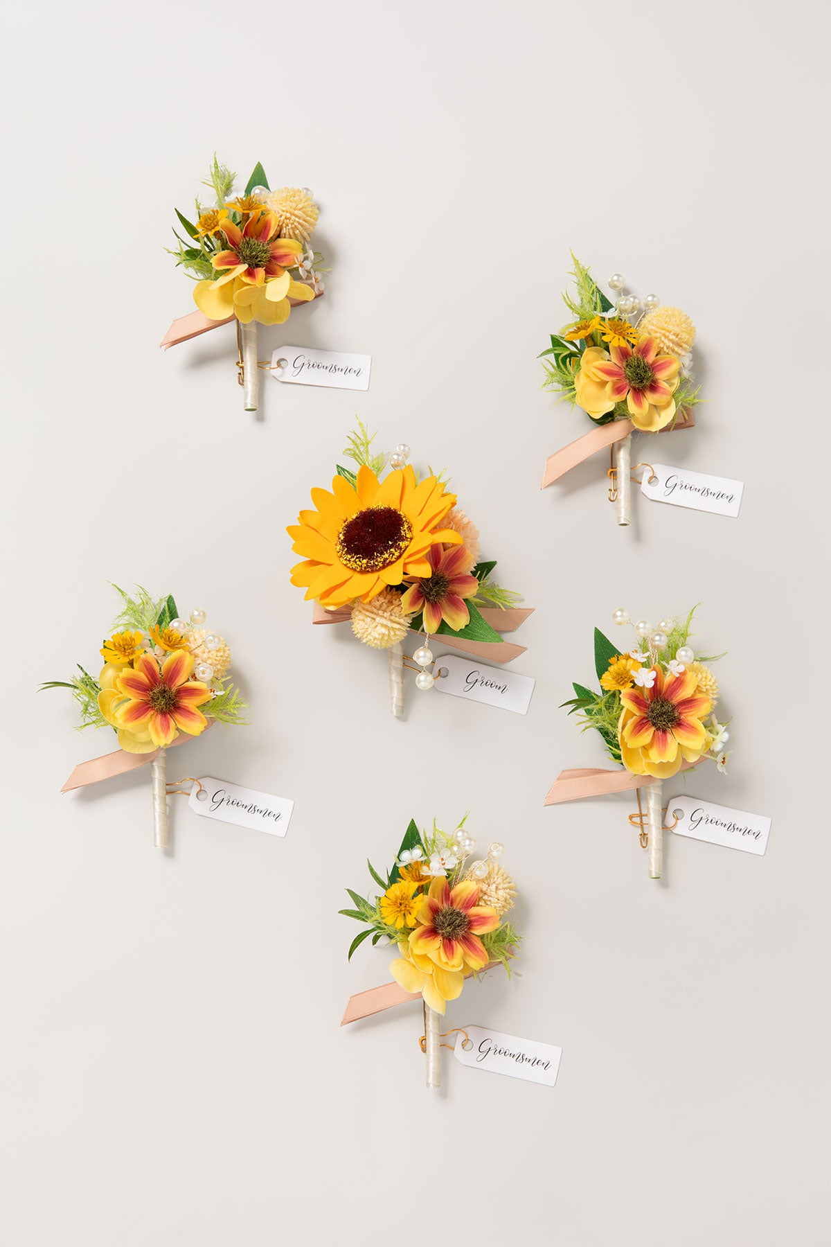 Boutonnieres in Sunflower & Peach