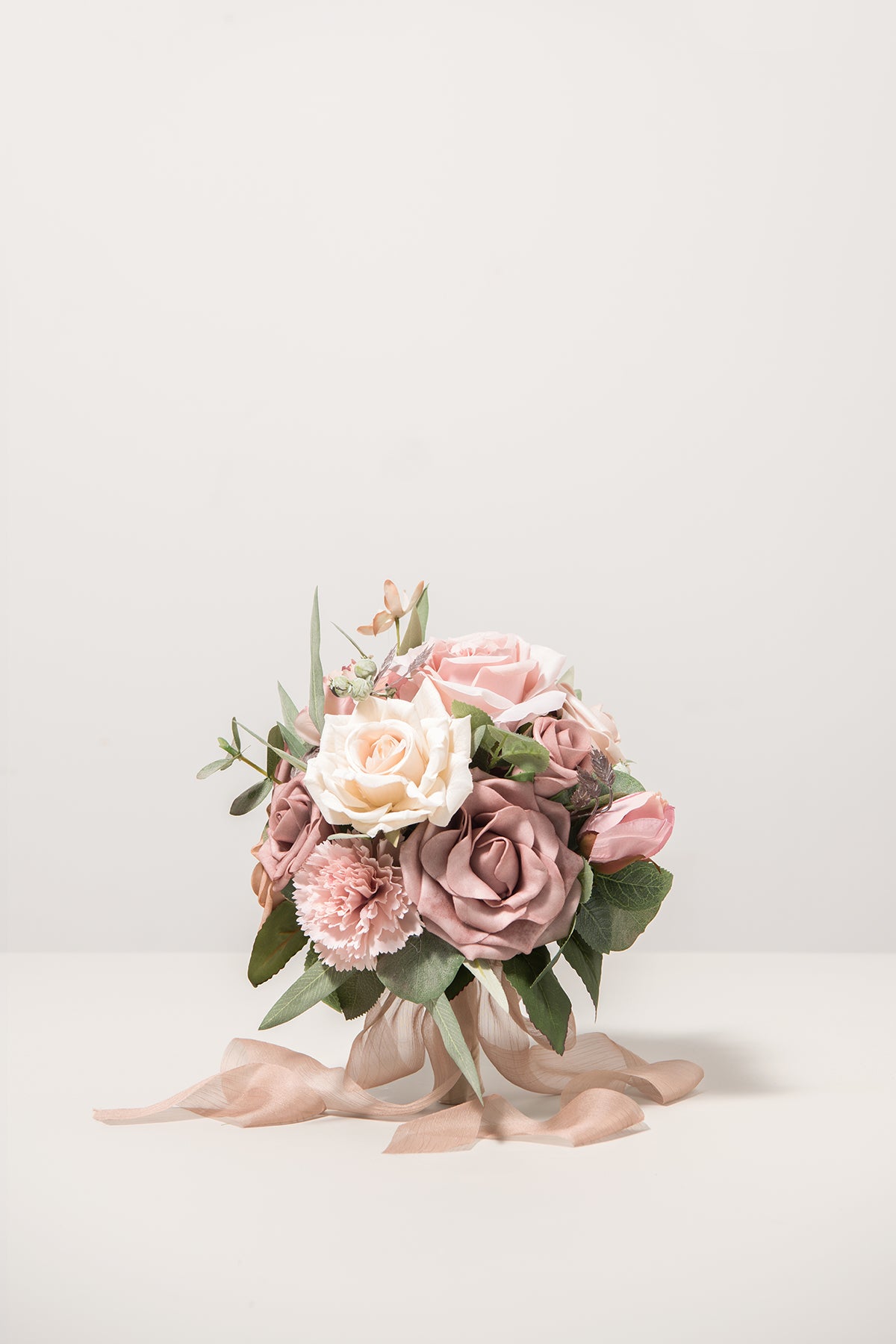 Round Bridesmaid Bouquets in Dusty Rose & Cream